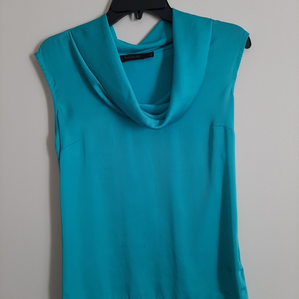 Limited turquoise blue blouse.
